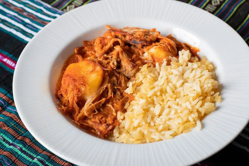 Hilachas,Made,Of,Shredded,Meat,,Tomatos,,Spices,,Potatos.,Served,On